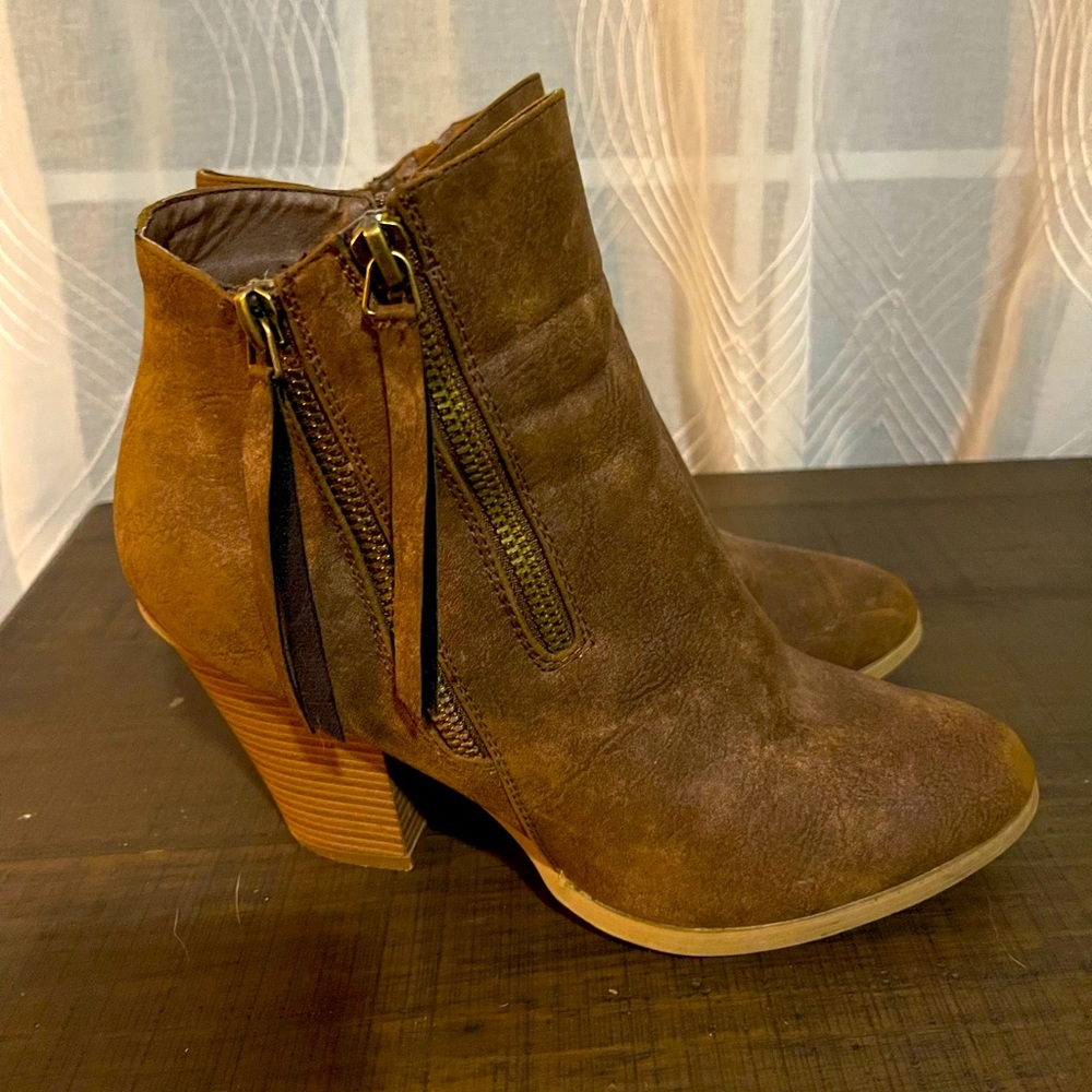 Brown high heeled minimal western tassel ankle booties